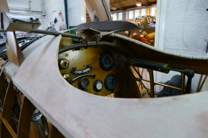A look in the cockpit of Shuttleworth's replica triplane under restoration.